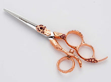 The Mirage Nirvana is a high quality shear for professional hairstylists. This pair of shears features a beautiful rose gold handle.