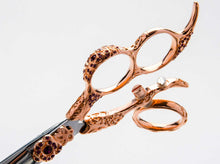 The Mirage Nirvana is a high quality shear for professional hairstylists. This pair of shears features a beautiful rose gold handle. Close-up handle view